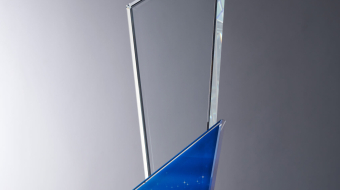 crystal trophy against gray background