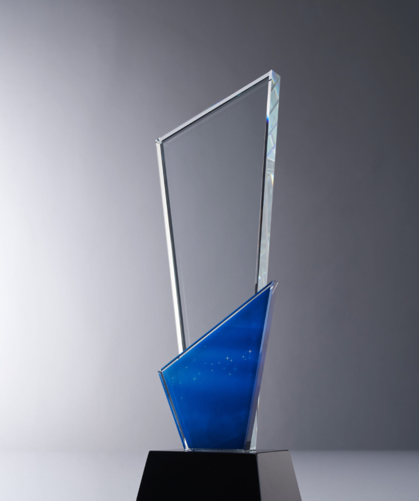 crystal trophy against gray background