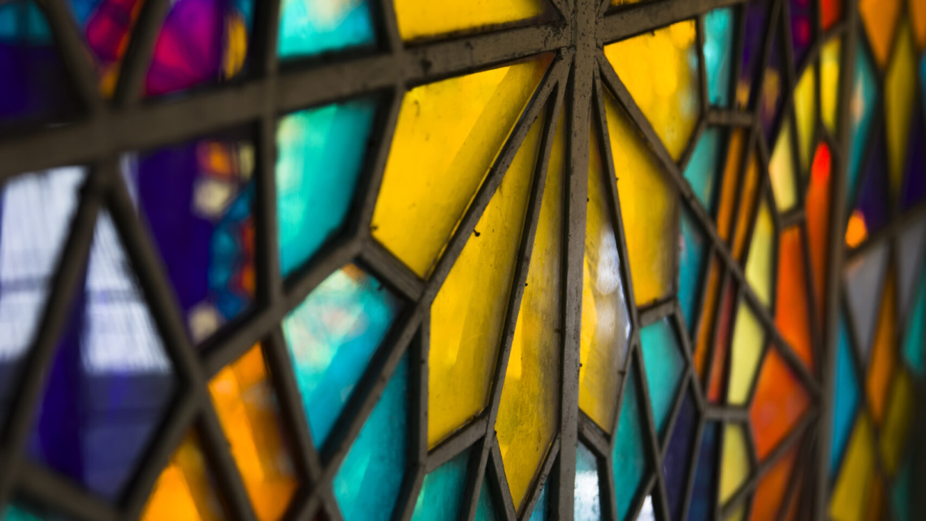 Closeup detail of the colorful stained glass window